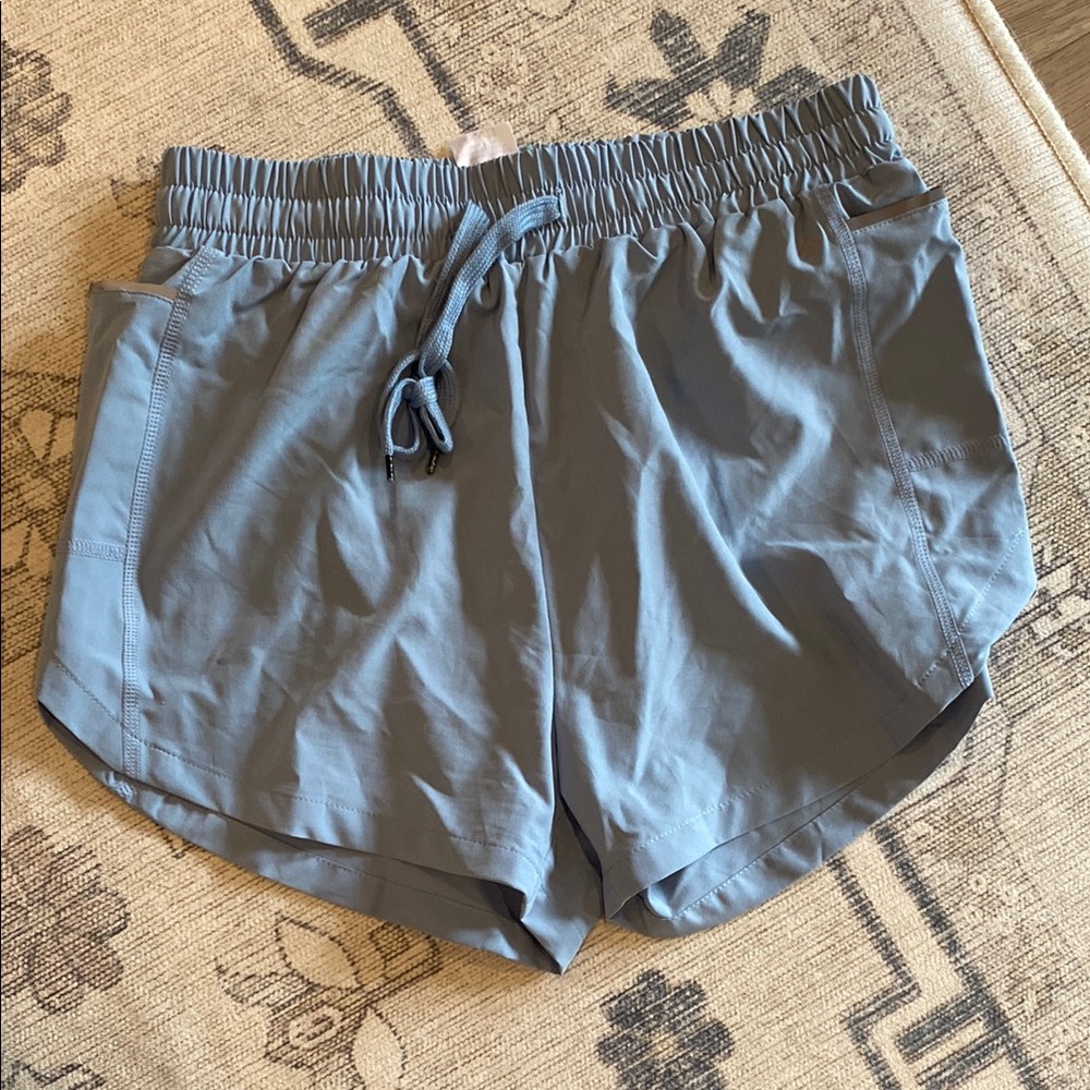 Calia by Carrie Underwood blue athletic shorts